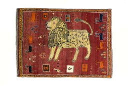 Full view of 2000s Persian Gabbeh rug from Iran / Persia, 223 × 160 cm in Red tones