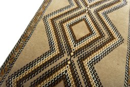 Backside of handmade 2000s Persian Gabbeh rug showing knot structure and weave density