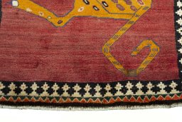 Central medallion detail of 2000s Persian Gabbeh rug from Iran / Persia