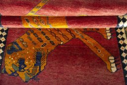 Full view of 2000s Persian Gabbeh rug from Iran / Persia, 213 × 108 cm in Red tones