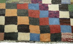Central medallion detail of 2000s Persian Gabbeh rug from Iran / Persia