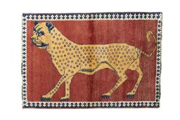 Full view of 2000s Persian Gabbeh rug from Iran / Persia, 153 × 105 cm in Red tones
