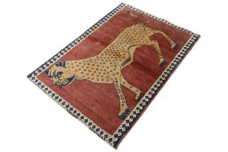 Corner detail of 2000s Persian Gabbeh rug showing border pattern and Wool pile