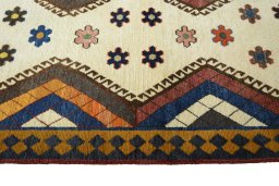 Close-up detail of 2000s Persian Gabbeh rug from Iran / Persia showing Wool weave