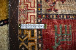 Close-up detail of 2000s Persian Gabbeh rug from Iran / Persia showing Wool weave
