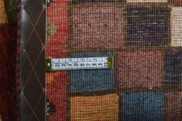 Close-up detail of 2000s Persian Gabbeh rug from Iran / Persia showing Wool weave