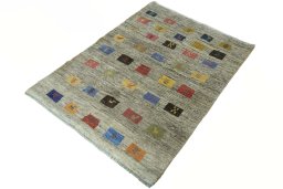 Corner detail of New Persian Gabbeh rug showing border pattern and Wool pile