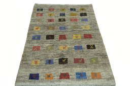 Surface texture of New Persian Gabbeh rug with natural Wool and intricate pattern