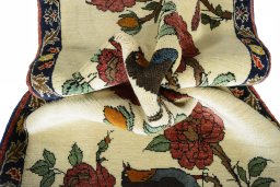 Corner detail of 2000s Persian Gabbeh rug showing border pattern and Wool pile