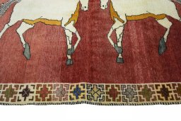 Close-up detail of 2000s Persian Gabbeh rug from Iran / Persia showing Wool weave