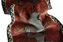 Corner detail of 2000s Persian Gabbeh rug showing border pattern and Wool pile