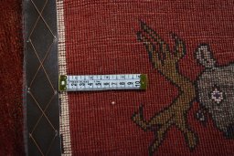 Close-up detail of 2000s Persian Gabbeh rug from Iran / Persia showing Wool weave