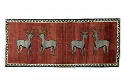 Full view of 2000s Persian Gabbeh rug from Iran / Persia, 171 × 74 cm in Red tones