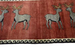 Close-up detail of 2000s Persian Gabbeh rug from Iran / Persia showing Wool weave