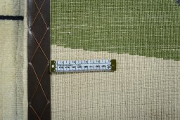 Close-up detail of 2000s Persian Gabbeh rug from Iran / Persia showing Wool weave