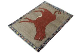 Corner detail of 2000s Persian Gabbeh rug showing border pattern and Wool pile