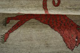Full view of 2000s Persian Gabbeh rug from Iran / Persia, 115 × 82 cm in Brown tones