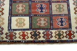 Central medallion detail of 2000s Persian Gabbeh rug from Iran / Persia