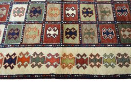 Close-up detail of 2000s Persian Gabbeh rug from Iran / Persia showing Wool weave