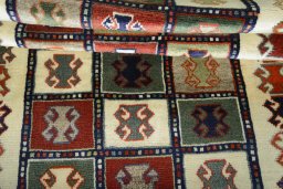 Full view of 2000s Persian Gabbeh rug from Iran / Persia, 165 × 107 cm in Multi Color tones