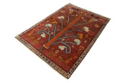 Corner detail of 2000s Persian Gabbeh rug showing border pattern and Wool pile