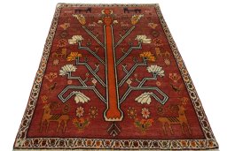 Surface texture of 2000s Persian Gabbeh rug with natural Wool and intricate pattern