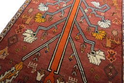 Backside of handmade 2000s Persian Gabbeh rug showing knot structure and weave density