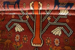 Full view of 2000s Persian Gabbeh rug from Iran / Persia, 191 × 133 cm in Red tones
