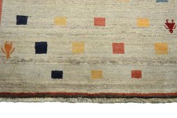 Central medallion detail of 2000s Persian Gabbeh rug from Iran / Persia