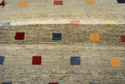 Full view of 2000s Persian Gabbeh rug from Iran / Persia, 144 × 103 cm in Beige tones