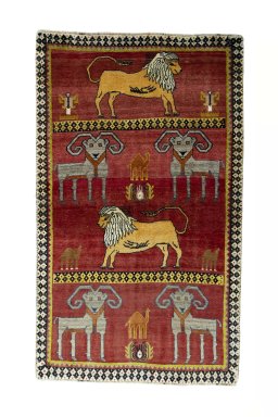 Full view of 2000s Persian Gabbeh rug from Iran / Persia, 190 × 112 cm in Red tones