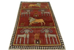 Surface texture of 2000s Persian Gabbeh rug with natural Wool and intricate pattern
