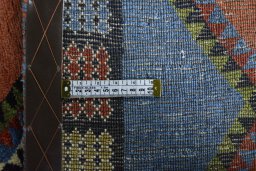 Close-up detail of 2000s Persian Gabbeh rug from Iran / Persia showing Wool weave