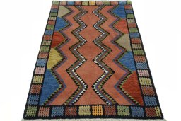 Surface texture of 2000s Persian Gabbeh rug with natural Wool and intricate pattern