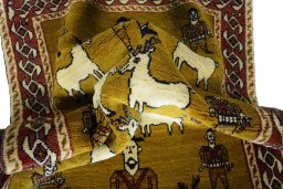Corner detail of 2000s Persian Gabbeh rug showing border pattern and Wool pile
