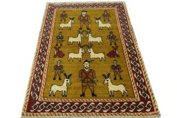 Surface texture of 2000s Persian Gabbeh rug with natural Wool and intricate pattern