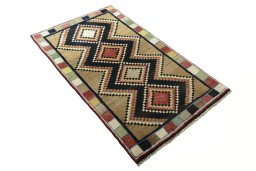 Close-up detail of 2000s Persian Gabbeh rug from Iran / Persia showing Wool weave