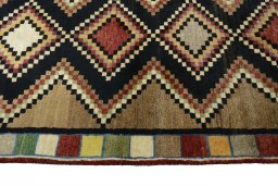 Close-up detail of 2000s Persian Gabbeh rug from Iran / Persia showing Wool weave