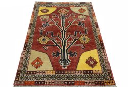 Surface texture of 2000s Persian Gabbeh rug with natural Wool and intricate pattern