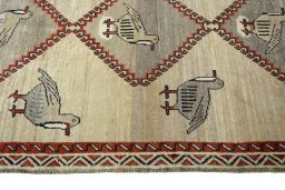 Close-up detail of 2000s Persian Gabbeh rug from Iran / Persia showing Wool weave