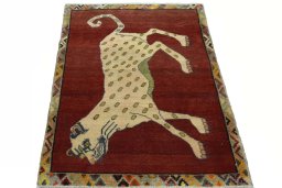 Surface texture of 2000s Persian Gabbeh rug with natural Wool and intricate pattern