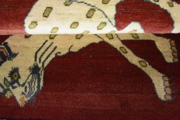 Full view of 2000s Persian Gabbeh rug from Iran / Persia, 116 × 83 cm in Red tones
