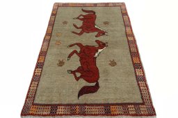 Surface texture of 2000s Persian Gabbeh rug with natural Wool and intricate pattern
