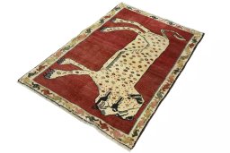 Corner detail of 2000s Persian Gabbeh rug showing border pattern and Wool pile