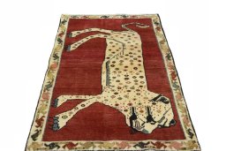 Surface texture of 2000s Persian Gabbeh rug with natural Wool and intricate pattern
