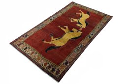 Corner detail of 2000s Persian Gabbeh rug showing border pattern and Wool pile
