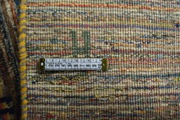 Close-up detail of 2000s Persian Gabbeh rug from Iran / Persia showing Wool weave