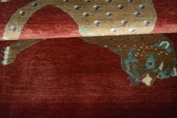 Full view of 2000s Persian Gabbeh rug from Iran / Persia, 144 × 93 cm in Red tones