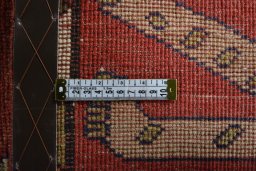 Corner detail of 2000s Persian Gabbeh rug showing border pattern and Wool pile