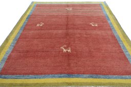 Surface texture of 2000s Persian Gabbeh rug with natural Wool and intricate pattern
